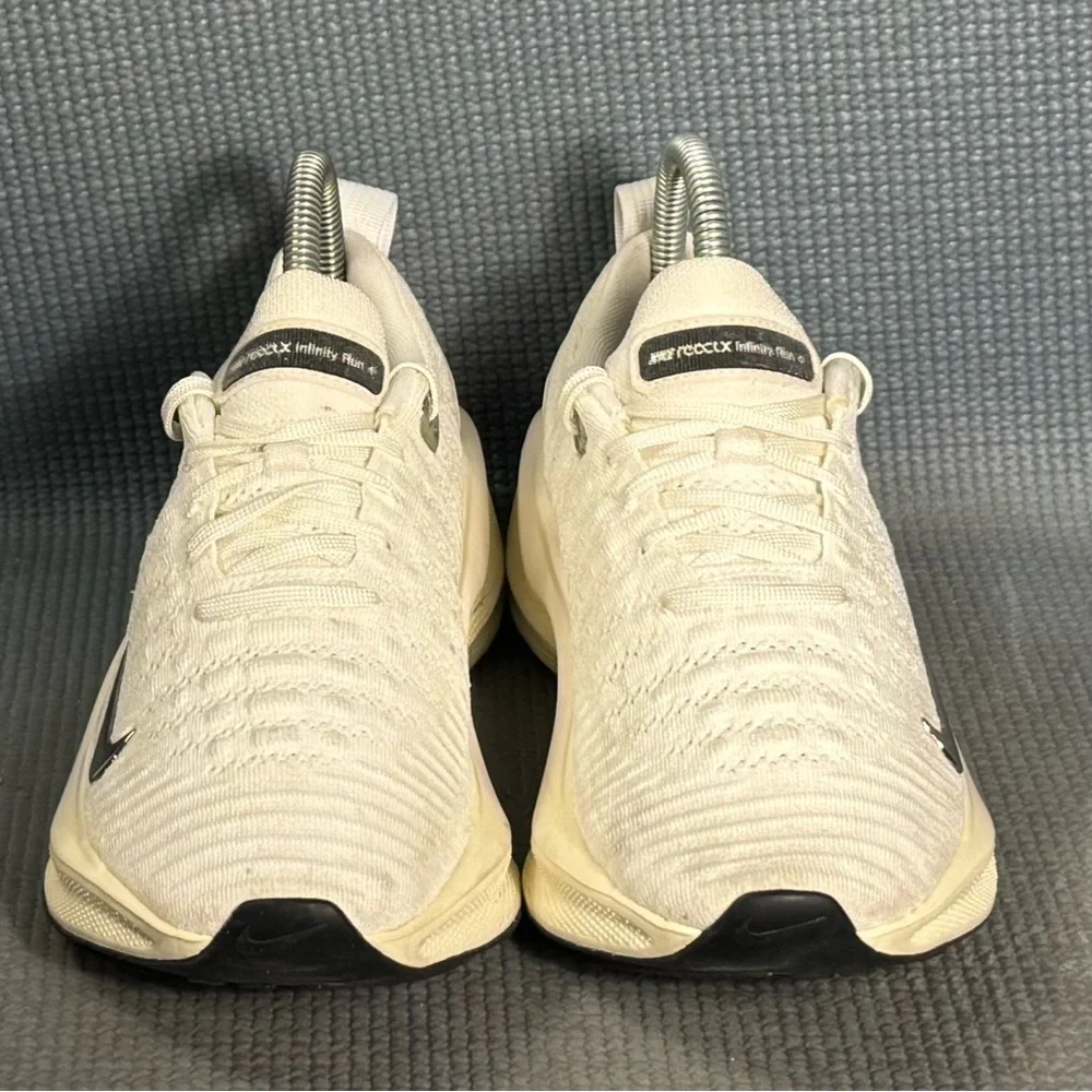 Nike Women's White Cream Running Shoes with Black Swoosh